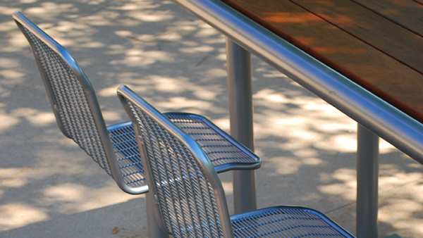 Individual seats at a table can be used for single person outside workstations