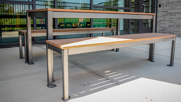 Outdoor table and bench with recycled wood for an outdoor office