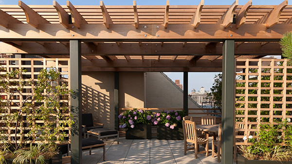 Pergolas can provide shade and a way to seperate spaces on a terrace